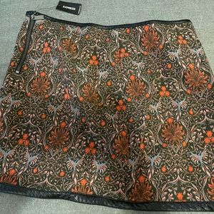 Express zip up with leather trim skirt